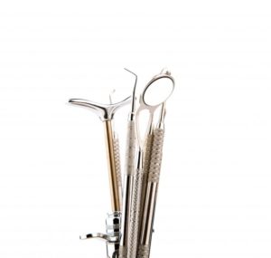 dental-tools-and-equipment-over-white-background_1232-1743